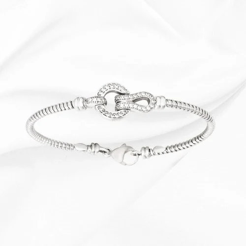 Bracelet jonc tubogaz, 2.9mm de largeur motif boucle avec zirconiums, 60x50mm, Clémence, en Argent 925/000 rhodié l'Etabli du Bijoutier, Haguenau