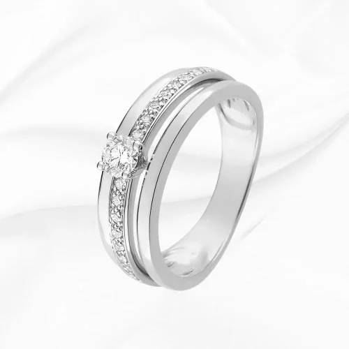 Solitaires accompagnes en Or 750/000 Blanc, diamant central 0.20ct, poids total 0.29ct, L'Etabli du Bijoutier